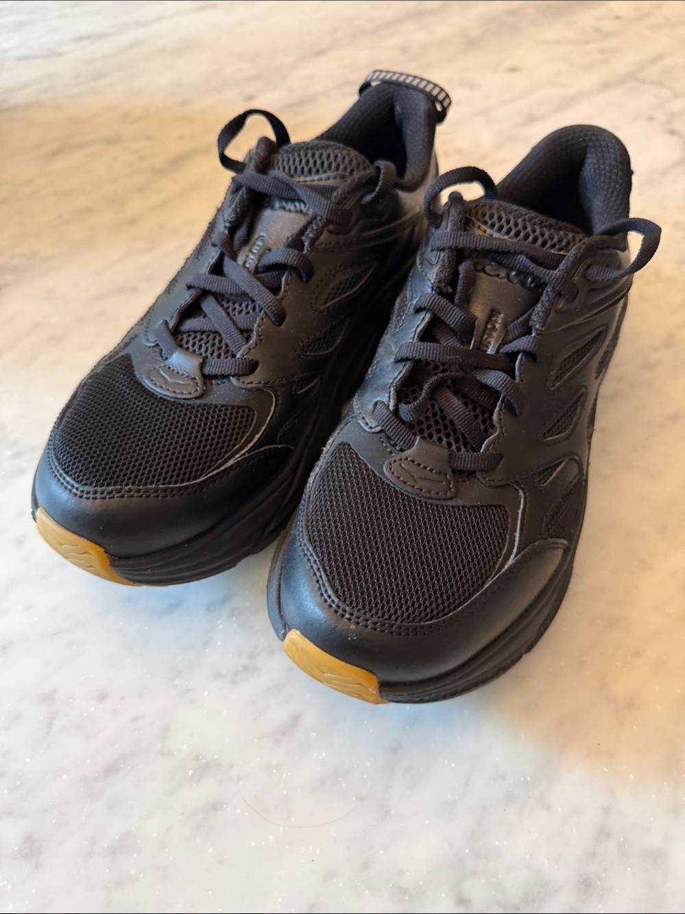 HOKA Unisex Clifton L Leather Mesh Sneakers in Black / Gum Sole